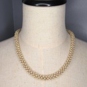 Hand stitched drop necklace